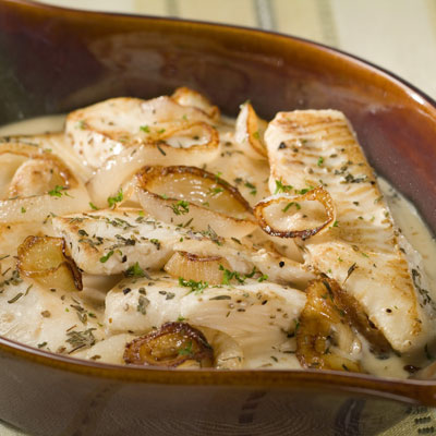 Fish Baked In Creamy Milk Sauce with Onions & Herbs